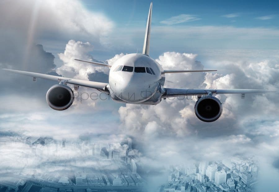 Airplane In The Clouds